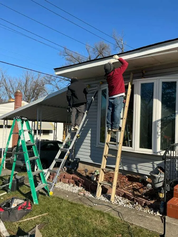 Restoration crew performing exterior repair in Green Bay